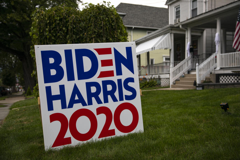 SCRANTON, PENNSYLVANIA - SEPTEMBER 11: A political poster favoring U.S. presidential candidate former Vice President Joe Biden and Senator Kamala Harris is placed on a front lawn September 11, 2020 in Scranton, Pennsylvania. Republican candidate Donald Trump won this part of northeastern Pennsylvania in 2016. Signs are a big element in the 2020 election campaign.  (Photo by Robert Nickelsberg/Getty Images)