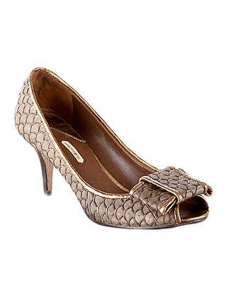 A low heel and peep toe make these shoes playful yet appropriate for everyday wear.