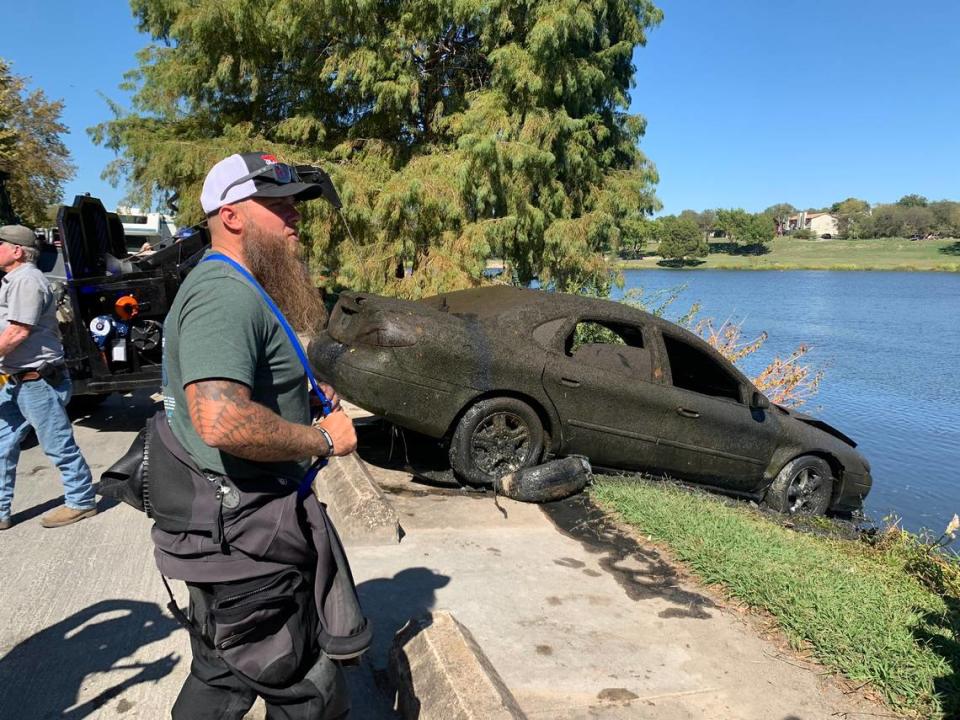 Doug Bishop and other divers located submerged cars — like this Fort Taurus — at Lake Como and helped haul them from the water on Tuesday. Multiple dive teams are working with Fort Worth law enforcement from Oct. 29 to Oct. 23 to pull 25 cars from Fort Worth-area lakes. 