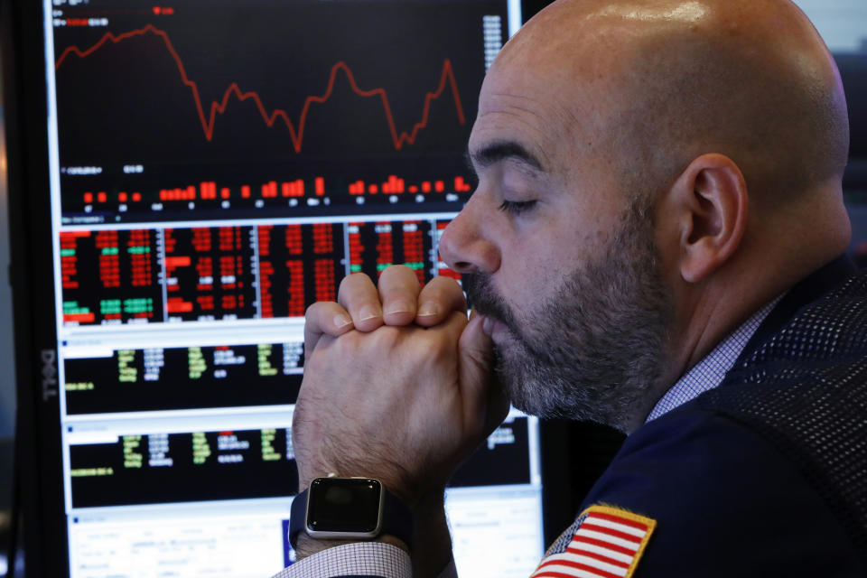 Trader Fred DeMarco works on the floor of the New York Stock Exchange, Thursday, Dec. 6, 2018. U.S. stocks tumbled in early trading Thursday following a sell-off in overseas markets. (AP Photo/Richard Drew)