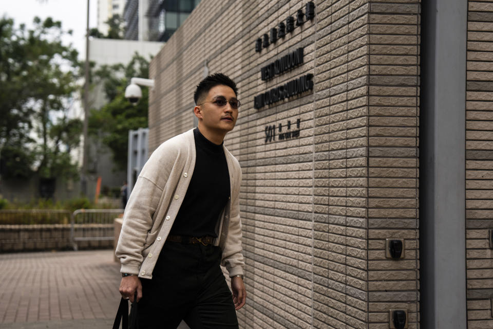 Pro-democracy activist Lee Yue-shun arrives at the West Kowloon courts as closing arguments open in Hong Kong's largest national security trial of 47 pro-democracy figures in Hong Kong, Wednesday, Nov. 29, 2023. (AP Photo/Louise Delmotte)