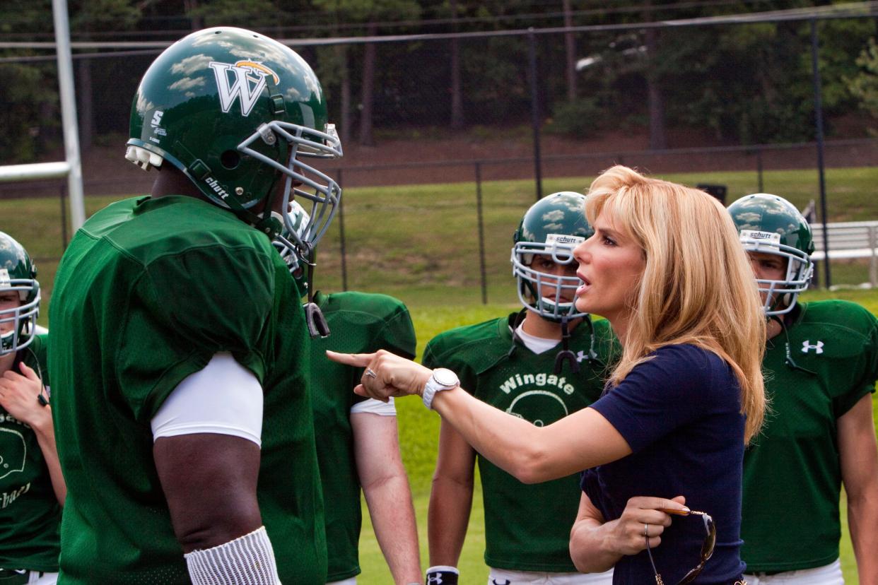 Sandra Bullock plays adoptive mom Leigh Anne Tuohy to Quinton Aaron's Michael Oher in "The Blind Side."