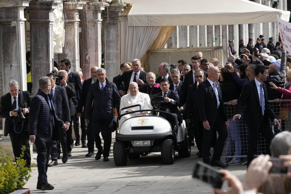 Pope Francis arrives in St. Mark's Square to celebrate a mass in Venice, Italy, Sunday, April 28, 2024. The Pontiff arrived for his first-ever visit to the lagoon town including the Vatican pavilion at the 60th Biennal of Arts. (AP Photo/Antonio Calanni)