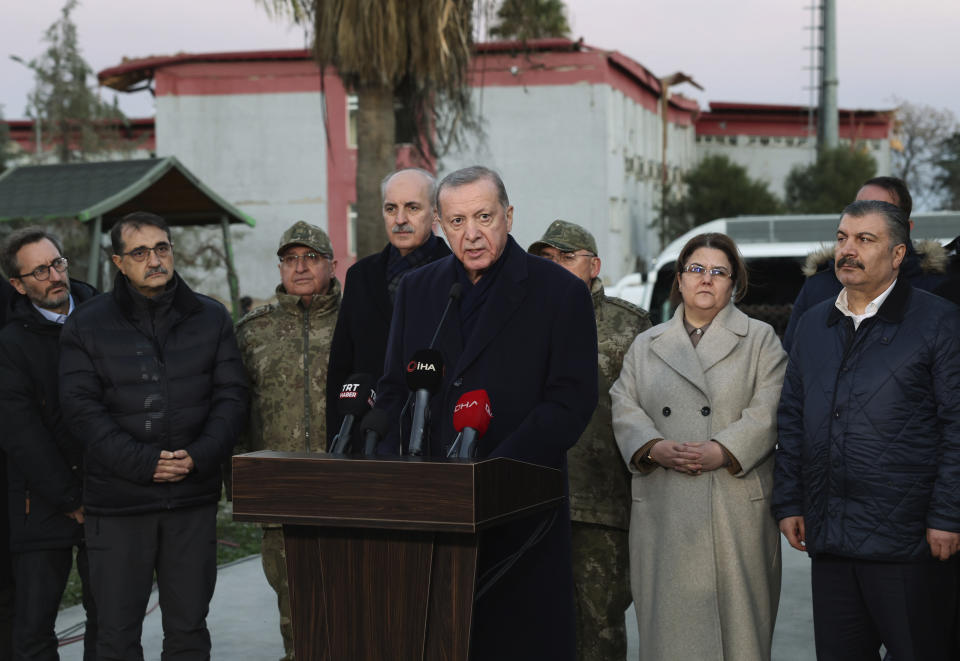 <p>Turkey's President Recep Tayyip Erdogan speaks to the media as he visits the cities destroyed by Monday earthquake in Kahramanmaras, southern Turkey, Wednesday, Feb. 8, 2023. Thinly stretched rescue teams worked through the night in Turkey and Syria, pulling more bodies from the rubble of thousands of buildings toppled by a catastrophic earthquake. The death toll rose Wednesday to more than 9,500, making the quake the deadliest in more than a decade. (Turkish Presidency via AP )</p> 