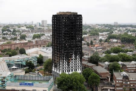 FILE PHOTO - A general view shows the Grenfell Tower, which was destroyed in a fatal fire, in London, Britain July 15, 2017. REUTERS/Tolga Akmen