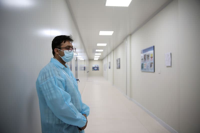 Dr. Omar Saeed, the project coordinator who was part of phase 3 trials of the PakVac coronavirus disease (COVID-19) vaccine, which is being produced locally, stands at the premises of the National Institute of Health in Islamabad