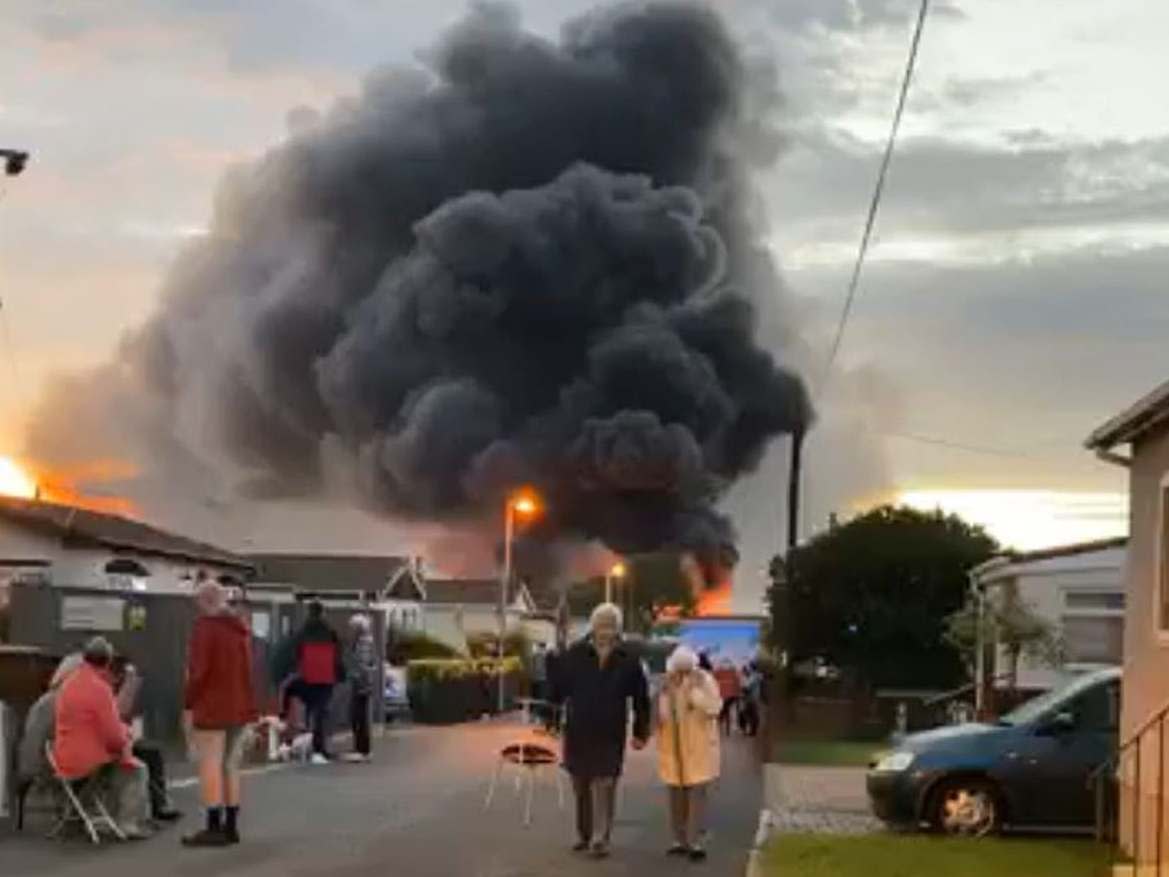 Handout photo taken from the Facebook page of Joe Dis, showing a huge blaze that firefighters have been battling at an industrial building in Kent, after reports of an explosion: PA