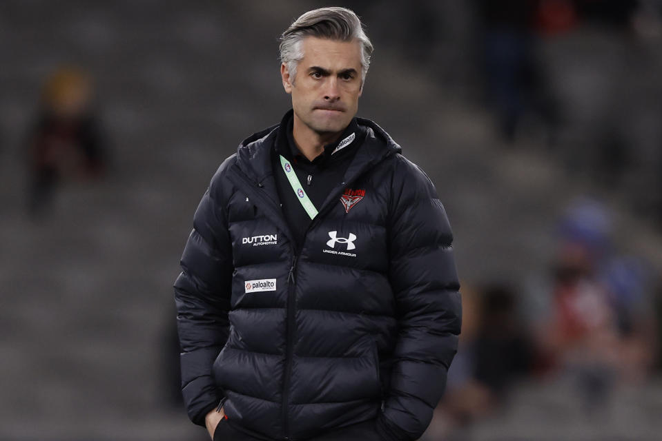 MELBOURNE, AUSTRALIA - JULY 27:  Essendon assistant coach Daniel Giansiracusa looks on during the warm up before before  the round 20 AFL match between St Kilda Saints and Essendon Bombers at Marvel Stadium, on July 27, 2024, in Melbourne, Australia. (Photo by Darrian Traynor/Getty Images)