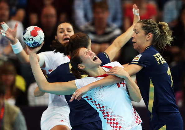 LONDON, ENGLAND - AUGUST 07: Kristina Franic (L) #14 of Croatia is defended by Begona Fernandez Molinos #18 of Spain during the Women's Quarterfinal match between Spain and Croatia on Day 11 of the London 2012 Olympic Games at The Copper Box on August 7, 2012 in London, England. (Photo by Jeff Gross/Getty Images)