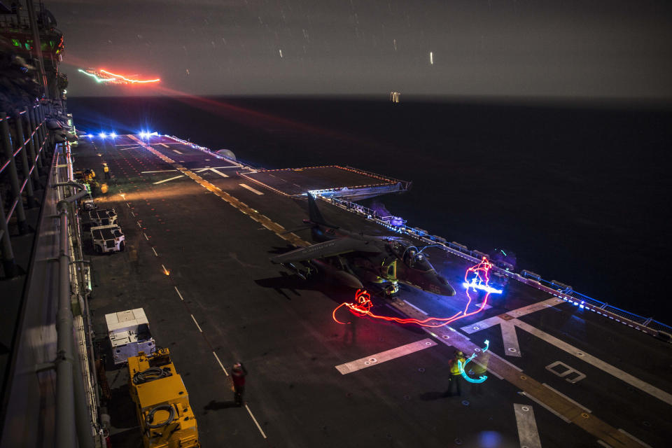 An AV-8B Harrier with Marine Medium Tiltrotor Squadron 161 (Reinforced), 15th Marine Expeditionary Unit, prepares to take-off aboard the USS Essex (LHD 2) during Amphibious Squadron/Marine Expeditionary Unit Integration Training (PMINT) off the coast of San Diego Feb. 24, 2015. The training prepares pilots and flight crew members for similar operations they may encounter while deployed this spring.