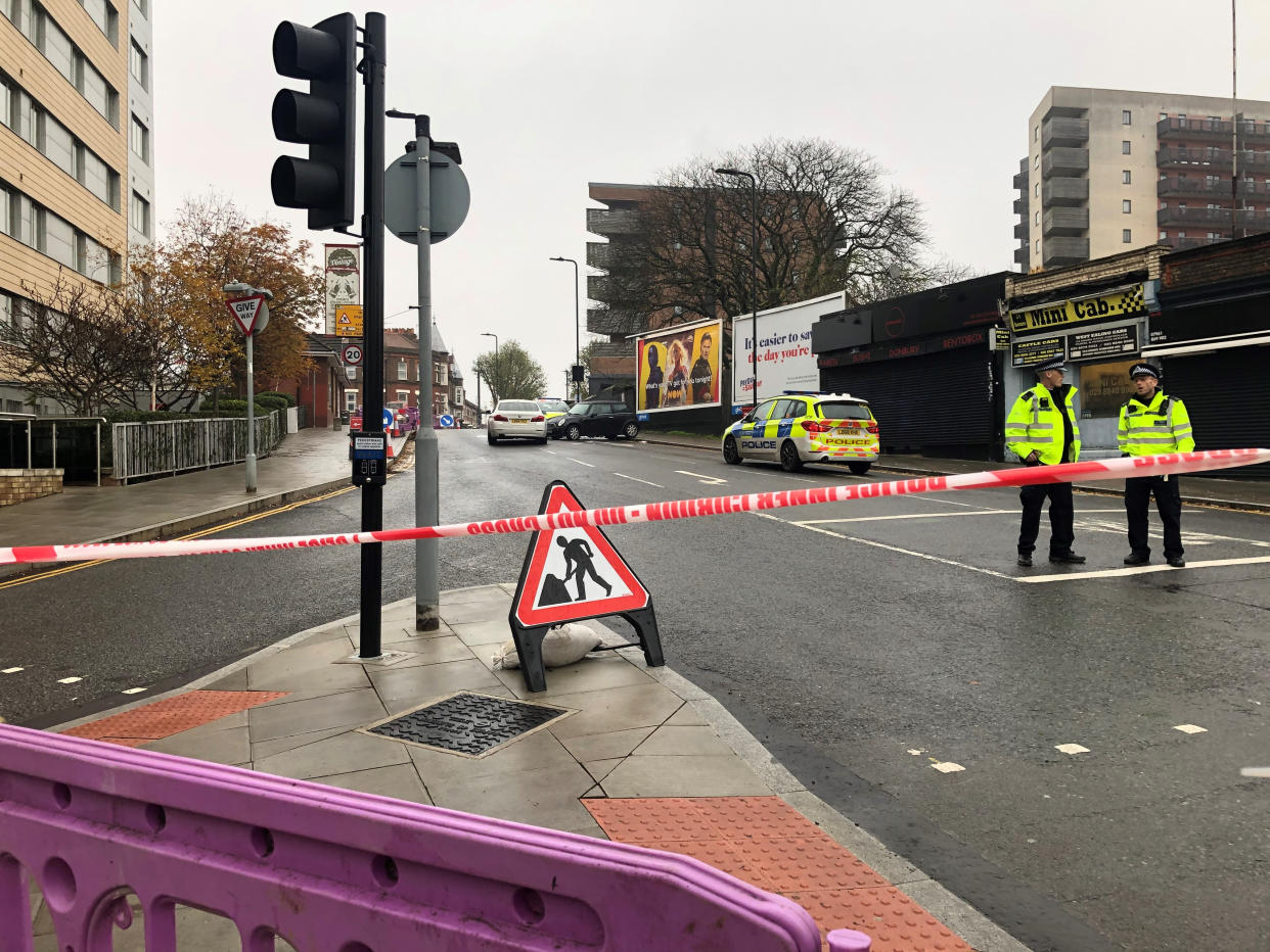 The scene outside West Ealing railway station where a man died after being stabbed before crashing his vehicle into another car in west London. (PA)