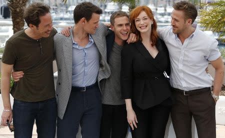 Director Ryan Gosling (R) and cast members Reda Kateb (L), Matt Smith (2ndL), Iain De Caestecker (C) and Christina Hendricks (2ndR) pose during a photocall for the film "Lost River" in competition for the category "Un Certain Regard" at the 67th Cannes Film Festival in Cannes May 20, 2014. REUTERS/Regis Duvignau