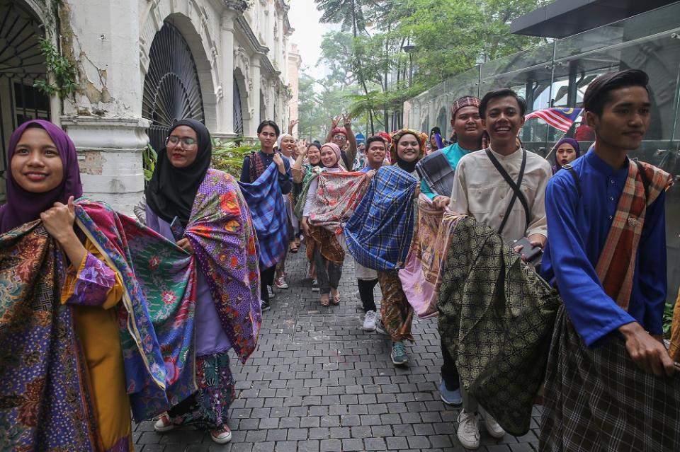 Participants take part in the ‘Keretapi Sarong’ event in conjunction with Malaysia Day in Kuala Lumpur September 16, 2019.