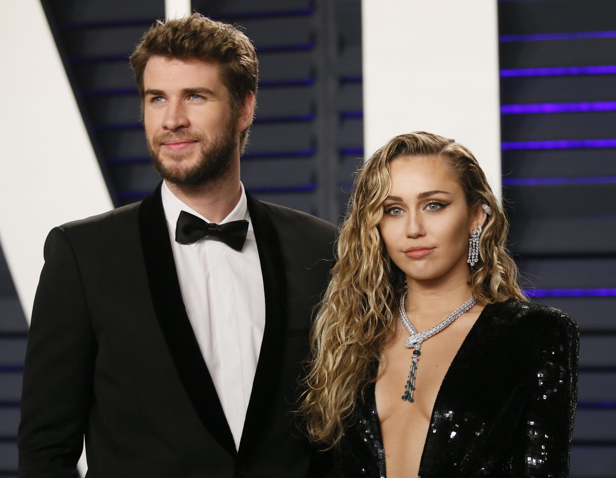 91st Academy Awards – Vanity Fair – Beverly Hills, California, U.S., February 24, 2019 – Liam Hemsworth and Miley Cyrus. REUTERS/Danny Moloshok