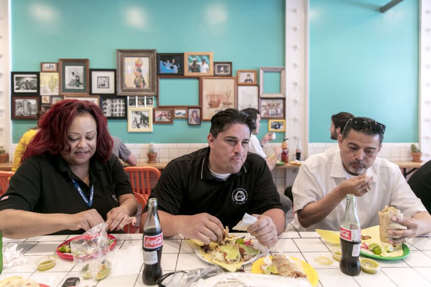LOS ANGELES, CALIFORNIA - APR. 19, 2019: Customers enjoy their lunch as Sonoratown taqueria fills up during a lunch rush on Friday, Apr. 19, 2019, in downtown Los Angeles. Sonoratown's co-owners Jennifer Feltham and her partner Teodoro Diaz-Rodriguez, Jr. opened the small but very popular taqueria three years ago, and, in the style of San Luis R'o Colorado, Sonora region of Northern Mexico, they focused on well-prepared carne asada and buttery flour tortillas. (Photo / Silvia Razgova) 3077219_la-fo-escarcega-sonoratown-review