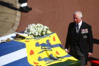 <p>Prince Charles walks behind the duke's coffin. </p>