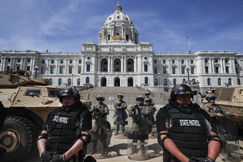 National Guardsmen and Minnesota state police form a barricade as protesters gather outside the Minnesota State Capitol on Sunday in Minneapolis. (Photo: ASSOCIATED PRESS)