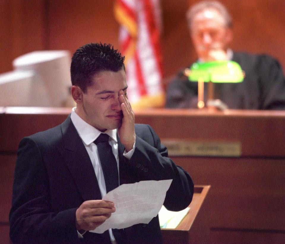 Kevin Papa, a former member of the "Devil Dogs" gang, cries as he reads a prepared statement to victim Jordan Jarvis and his family in Maricopa County Superior Court on March 6, 2000, in Mesa. Papa was apologizing for his part in a beating of Jarvis. Prosecutors introduced a videotape purportedly refuting the sincerity of his apology.