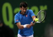 Tennis - Qatar Open - Men's singles semi-finals - Fernando Verdasco of Spain v Novak Djokovic of Serbia - Doha, Qatar - 6/1/2017 - Djokovic in action. REUTERS/Ibraheem Al Omari