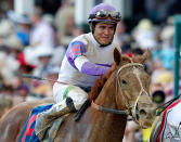 Mario Gutierrez smiles atop I'll Have Another after winning the 138th running of the Kentucky Derby at Churchill Downs on May 5, 2012 in Louisville, Kentucky. (Photo by Rob Carr/Getty Images)