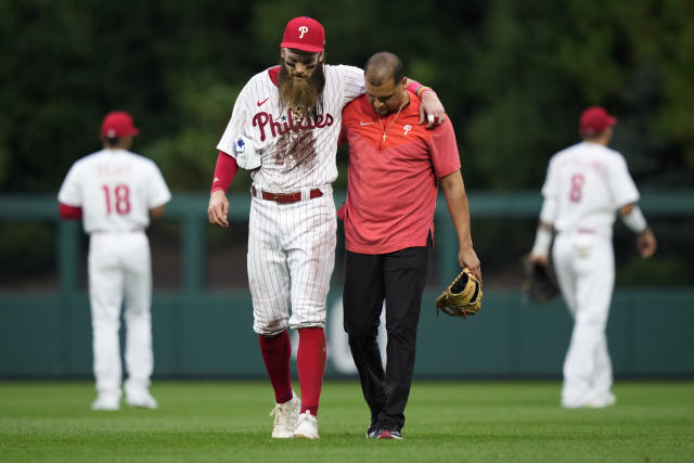 Love doing stuff with the community': Brandon Miller tosses first pitch at  Knights game