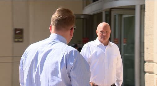 News Center 7's John Bedell approached former University of Dayton faculty member Michael Masterson at Dayton Municipal Court. Masterson was arrested as part of a large human trafficking sting in Ohio, according to the Ohio Attorney General. (AJ Ewry/Staff)