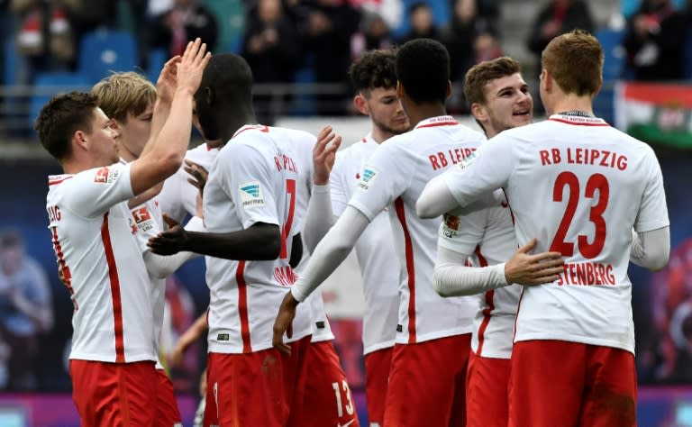 Leipzig players celebrate after their match against SC Freiburg in Leipzig, eastern Germany, on April 15, 2017