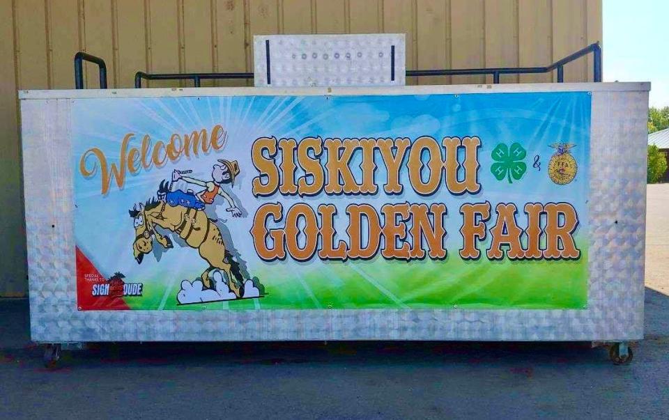 A banner promoting the Siskiyou Golden Fair and this weekend's junior livestock auction on display at the Jackson County Expo.
