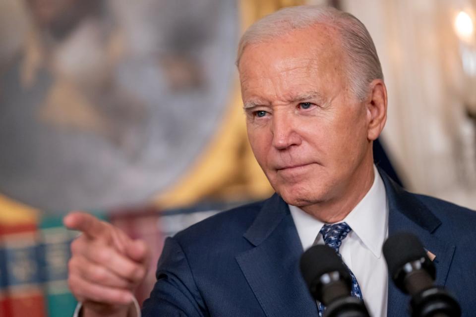 U.S. President Joe Biden delivers remarks in the Diplomatic Reception Room of the White House on Feb. 8, in Washington. Biden on Thursday said Israel must change to how it is handling the war against Hamas, including by allowing new humanitarian aid crossings into Gaza. (Nathan Howard/Getty Images - image credit)