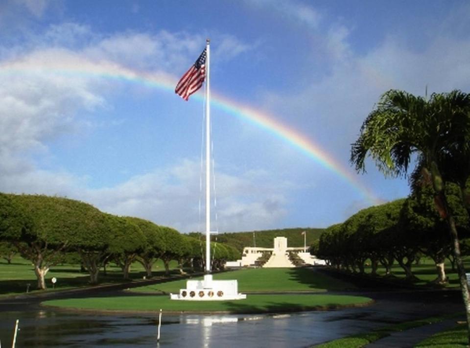 A rainbow appears over the National Memorial Cemetery of the Pacific in Honolulu, Hawaii. The remains of Army Corporal Rex Powell of Valdese NC were identified after being disinterred from the cemetery and analyzed at a Defense POW/MIA Accounting Agency lab.