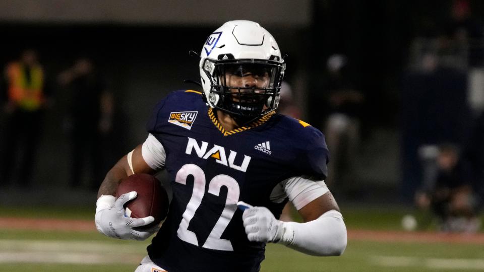 Northern Arizona running back Kevin Daniels (22) in the first half during an NCAA college football game against Arizona, Saturday, Sept. 18, 2021, in Tucson, Ariz. (AP Photo/Rick Scuteri)