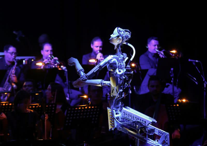 A robot maestro leads an orchestra at the Sharjah Performing Arts Academy in Sharjah