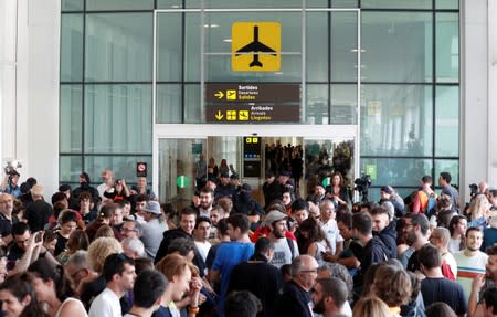 Protesters block an entrance to the airport due to a verdict in a trial over a banned independence referendum, in Barcelona