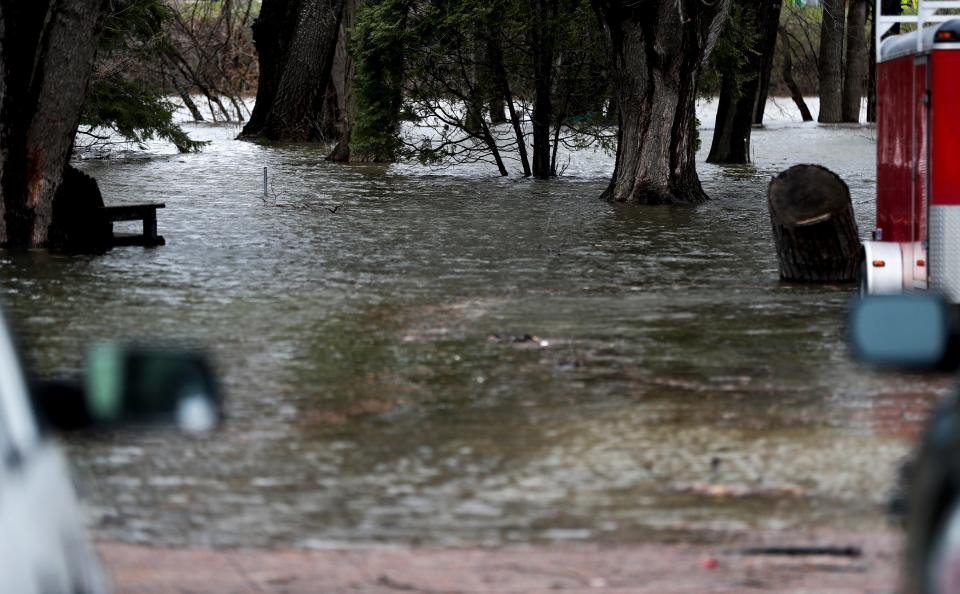 Scenes of flooding from a resident's backyard on Wednesday, April 29, 2020, along St. Clair Street in Green Bay, Wis.