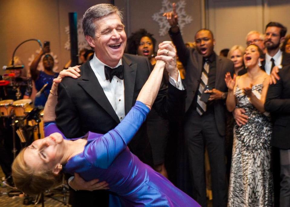 Gov. Roy Cooper dances with first lady Kristin Cooper at the inaugural ball to celebrate his inauguration at Marbles Kids Museum in downtown Raleigh on Friday, Jan. 6, 2017.