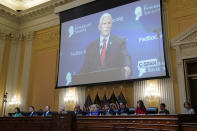 A video of former Vice President Mike Pence speaking is shown as committee members from left to right, Rep. Stephanie Murphy, D-Fla., Rep. Pete Aguilar, D-Calif., Rep. Adam Schiff, D-Calif., Rep. Zoe Lofgren, D-Calif., Chairman Bennie Thompson, D-Miss., Vice Chair Liz Cheney, R-Wyo., Rep. Adam Kinzinger, R-Ill., Rep. Jamie Raskin, D-Md., and Rep. Elaine Luria, D-Va., look on, as the House select committee investigating the Jan. 6 attack on the U.S. Capitol holds its first public hearing to reveal the findings of a year-long investigation, at the Capitol in Washington, Thursday, June 9, 2022. (AP Photo/J. Scott Applewhite)