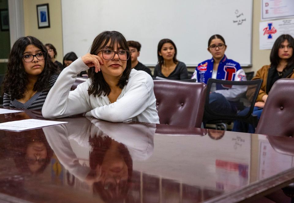 Defense Attorney Ana Gamino listens to feedback from coaches during a mock trial meeting at Indio High School in Indio, Calif., Wednesday, Feb. 7, 2024.