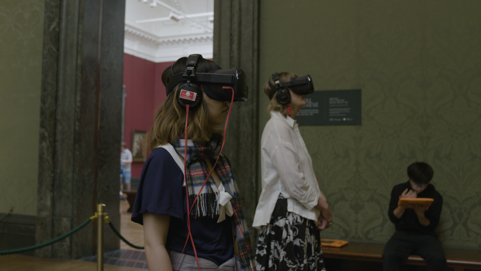 Visitors wear headsets to experience the painting (National Gallery/PA)