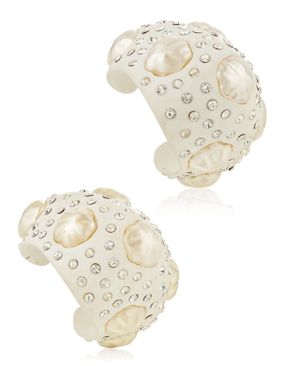 <p>These baroque faux pearl and aurora borealis rhinestone cuffs are estimate to be worth $2,000 to $3,000.</p>