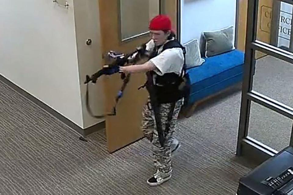 Audrey Hale can be seen prowling through the school carrying an assault rifle (Metropolitan Nashville Police De)