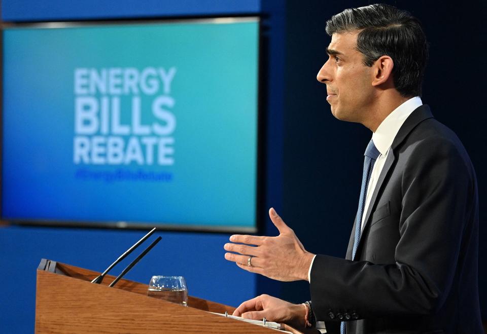 Britain's Chancellor of the Exchequer Rishi Sunak hosts a press conference in the Downing Street Briefing Room on February 3, 2022. - The UK government on Thursday stepped in to help the hardest-hit households struggling with the rising cost of living, announcing a £9 billion package to offset soaring energy bills. It followed an announcement by that energy regulator that the price cap on how much suppliers can charge consumers will jump by 54 percent due to soaring wholesale gas prices. (Photo by JUSTIN TALLIS / POOL / AFP) (Photo by JUSTIN TALLIS/POOL/AFP via Getty Images)