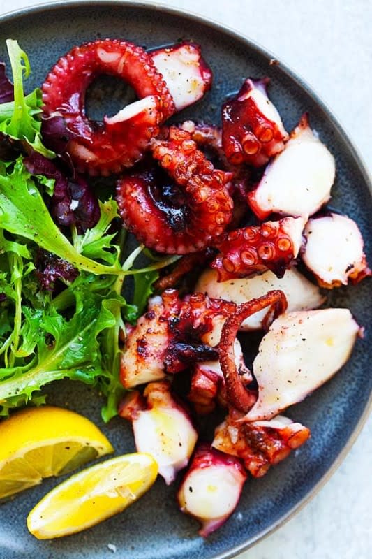 <p>Rasa Malaysia</p><p>Grilled octopus with olive oil, cayenne pepper and lemon. This Spanish grilled octopus with salad is the best and restaurant worthy, juicy, tender and delicious!</p><p><strong>Get the recipe: </strong><a href="https://rasamalaysia.com/grilled-octopus/" rel="nofollow noopener" target="_blank" data-ylk="slk:Grilled Octopus;elm:context_link;itc:0;sec:content-canvas" class="link "><strong>Grilled Octopus</strong></a></p>