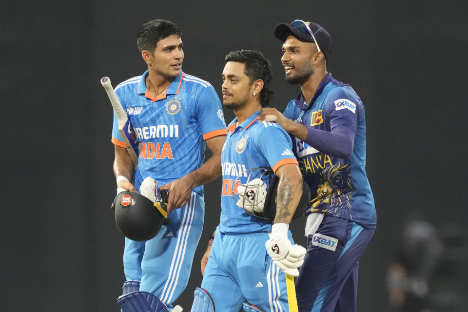 Sri Lanka's captain Dasun Shanaka congratulates India's Shubman Gill and Ishan Kishan after India won the Asia Cup final cricket match in Colombo, Sri Lanka, Sunday, Sept.17, 2023. (AP Photo/Eranga Jayawardena)