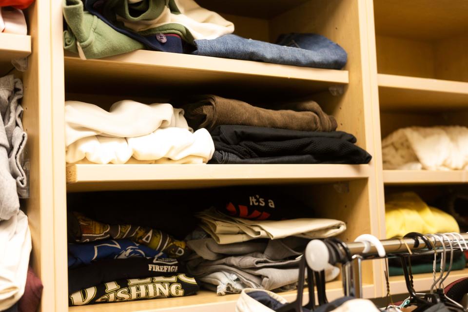 T-shirts can be seen on shelves inside of a closet for patients who are in need of clothes Friday, Dec. 18, 2023 at St. Francis Hospital Bartlett in Bartlett, Tenn.