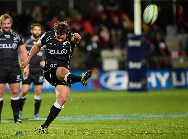 Francois Steyn of the Coastal Sharks kicks a conversion at the Super 15 rugby union match in Christchurch on May 17, 2014