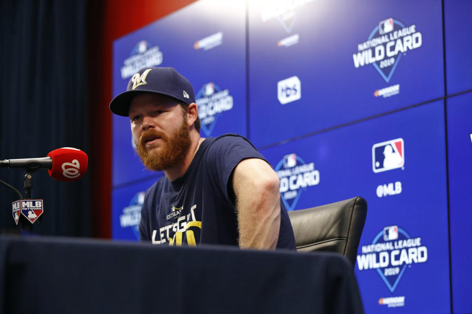 Milwaukee Brewers starting pitcher Brandon Woodruff speaks at a news conference, Monday, Sept. 30, 2019, in Washington. The Brewers are scheduled to face the Washington Nationals in a National League wild-card game Tuesday, Oct. 1. (AP Photo/Patrick Semansky)