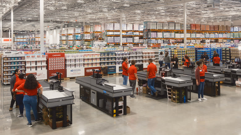 Costco workers manning checkouts