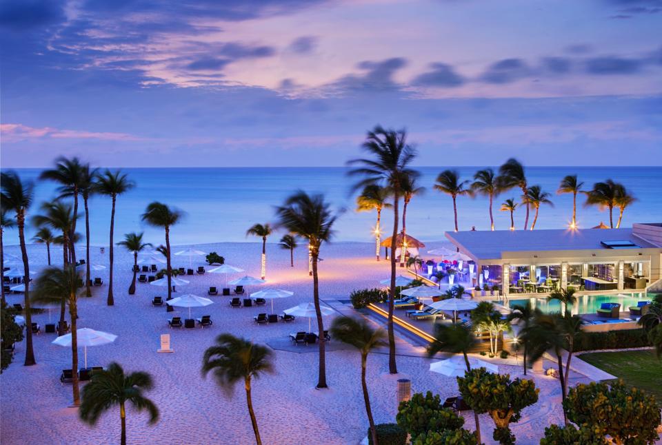 Experience magical sunsets over Eagle Beach at Aruba's  Bucuti and Tara Beach Resort.