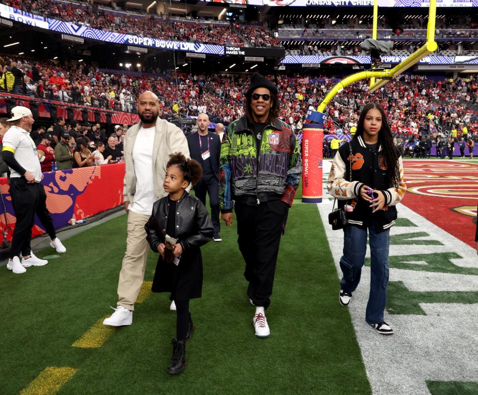 Juan 'OG' Perez, Rumi Carter, Jay-Z, and Blue Ivy Carter at the Super Bowl LVIII Pregame on February 11, 2024.