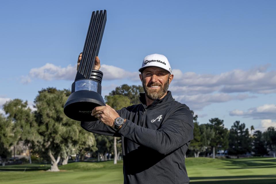 First-place individual champion captain Dustin Johnson, of 4Aces GC, poses with the trophy after the final round of LIV Golf Las Vegas at Las Vegas Country Club, Saturday, Feb. 10, 2024, in Las Vegas. (Montana Pritchard/LIV Golf via AP)